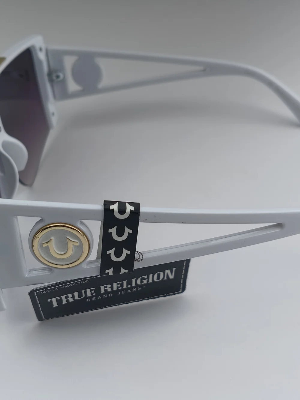 True Religion White Shield Sunglasses with Gold Accent and Purple Gradient Lens